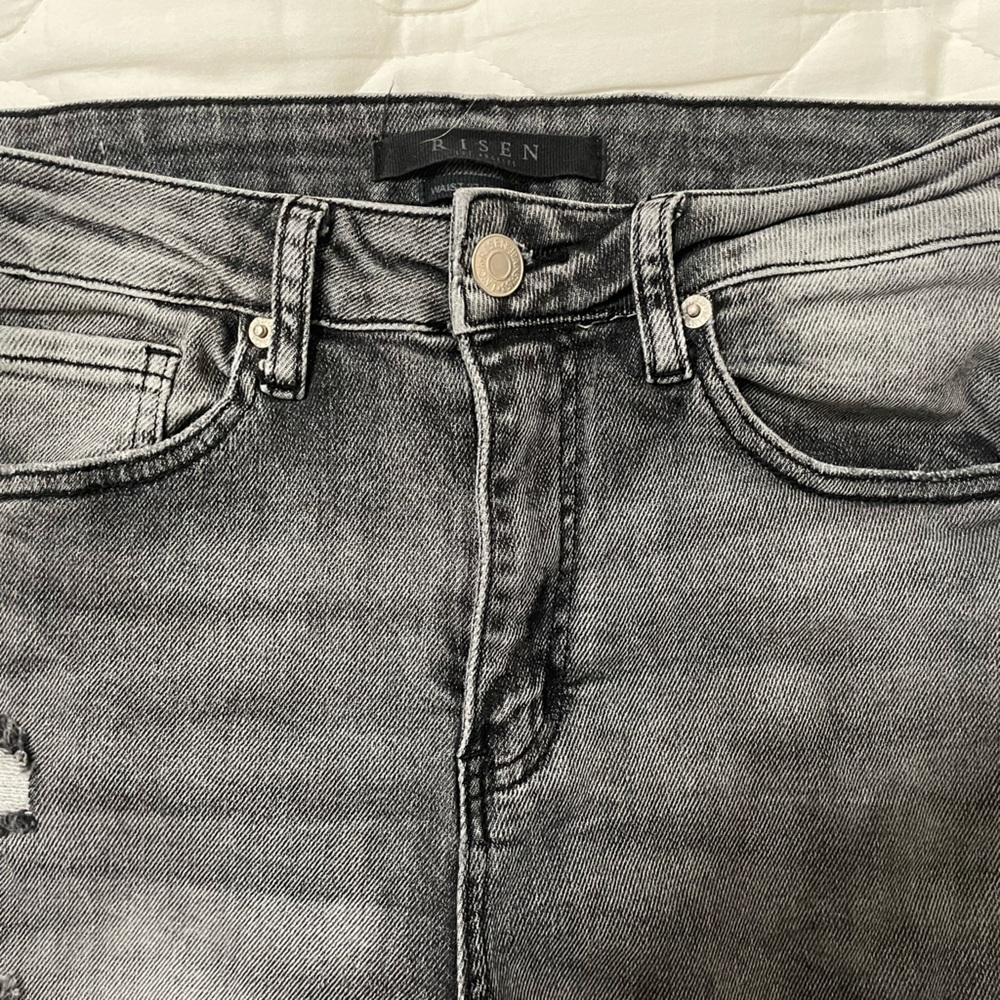 Black buckle jeans